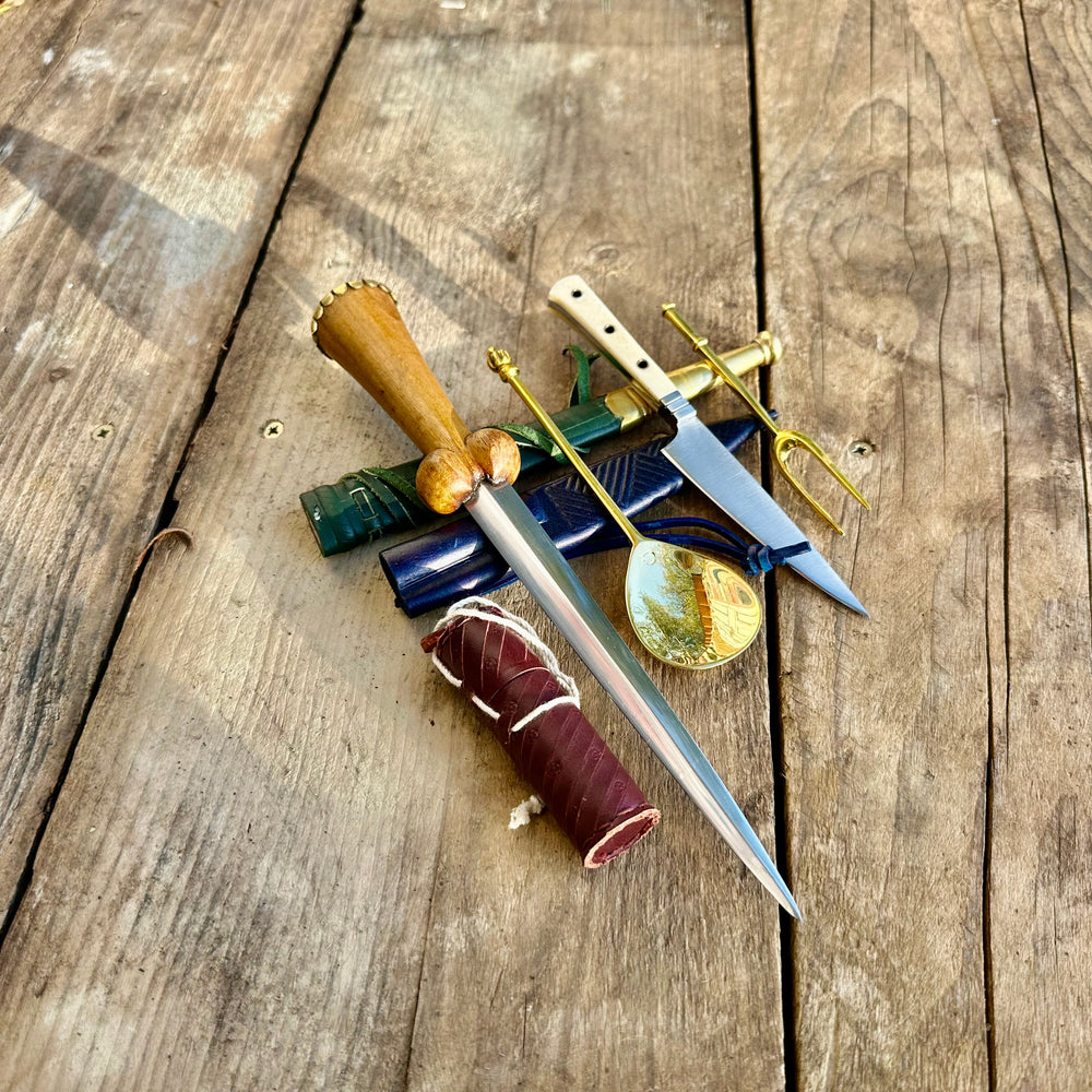 
                  
                    Tod Cutler My Lady's Bundle with purse bollock dagger, tcp, brass spoon and fork,, leather needle case
                  
                