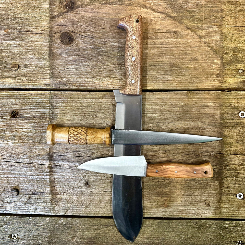
                  
                    Camp knife, whittle tang dagger and field knife
                  
                