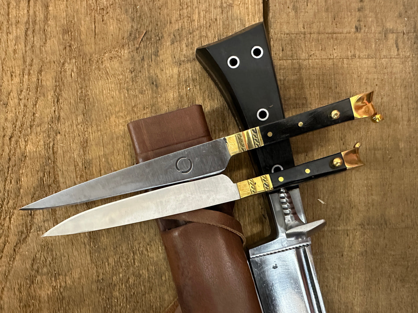 
                  
                    Bauernwehr with by knives with a brown scabbard
                  
                