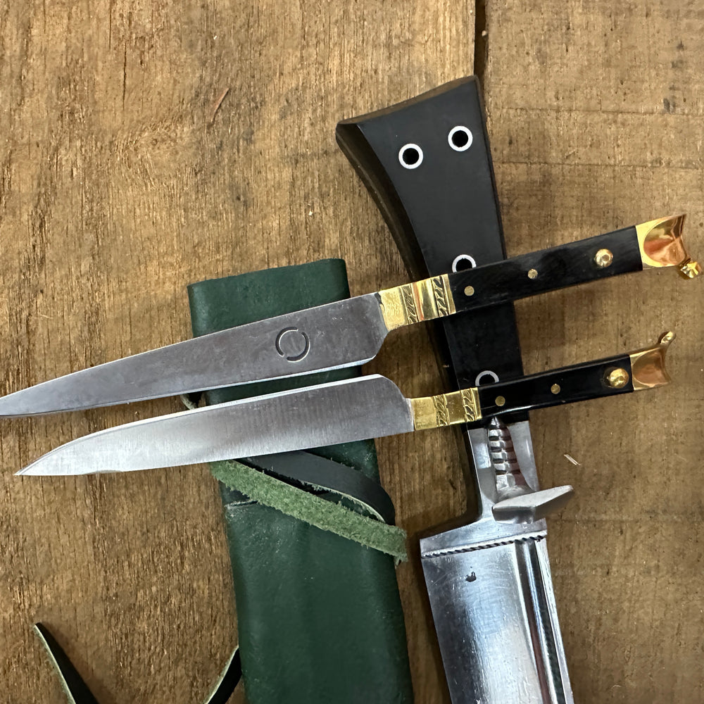 
                  
                    Bauernwehr with by knives with a green scabbard
                  
                