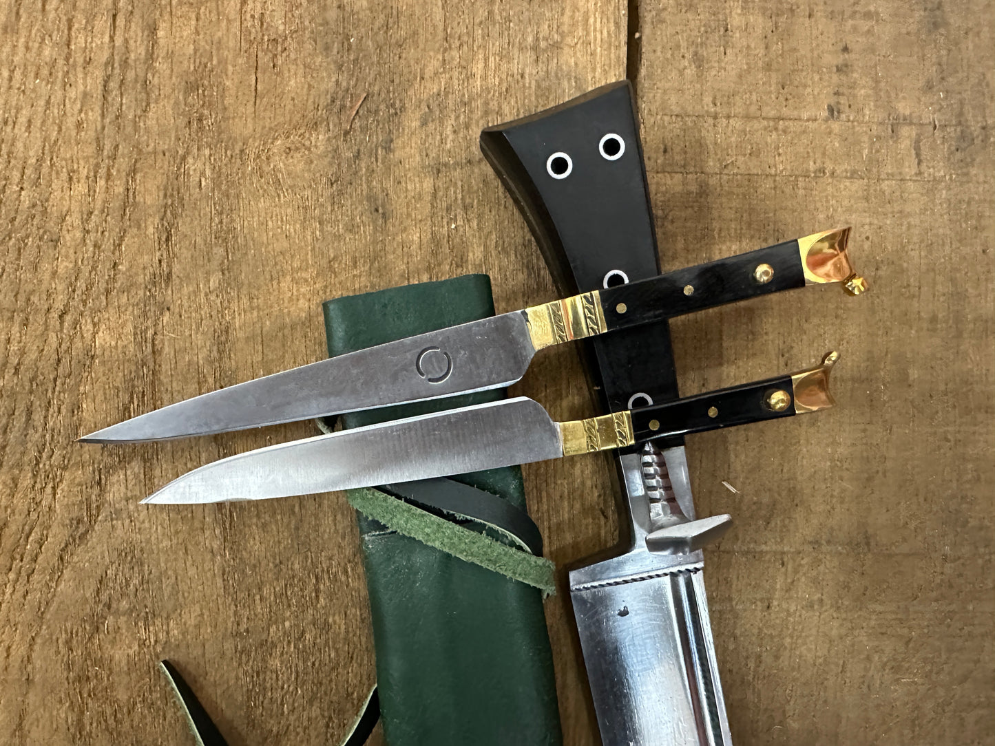 
                  
                    Bauernwehr with by knives with a green scabbard
                  
                