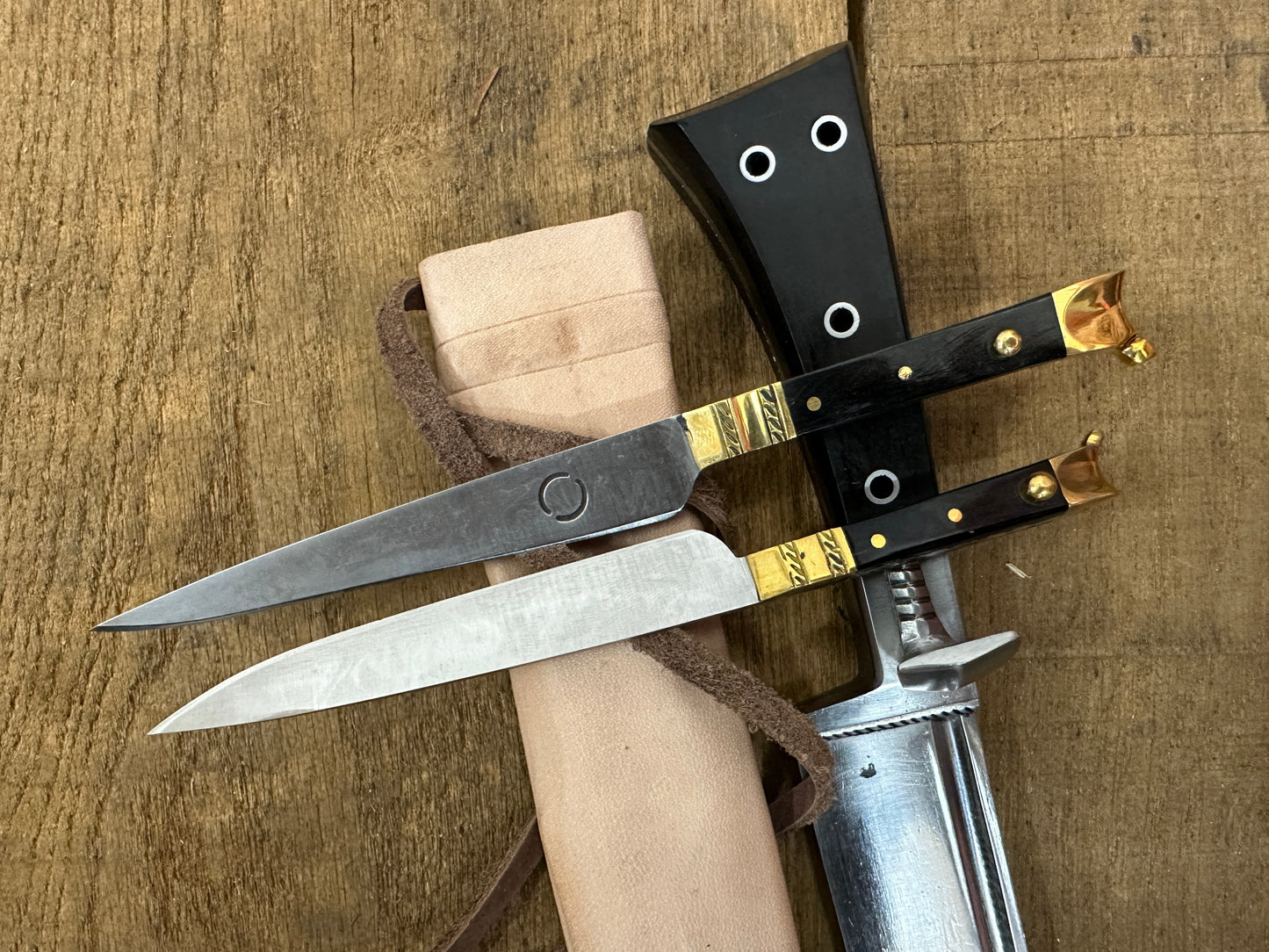 
                  
                    Bauernwehr with by knives with a natural scabbard
                  
                