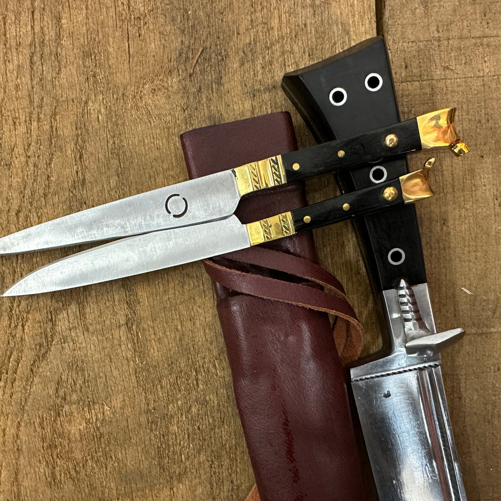 
                  
                    Bauernwehr with by knives with a red scabbard
                  
                