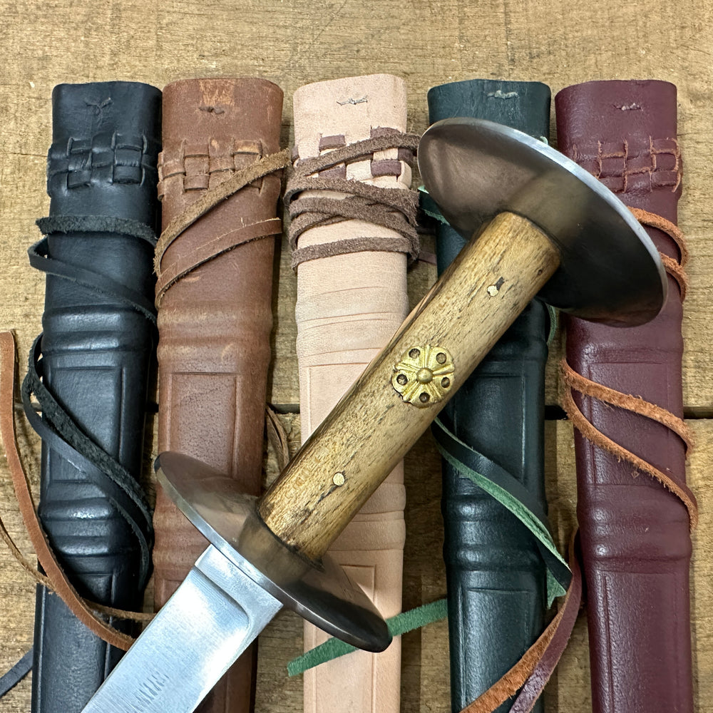 Wallace Rondel close up on assorted scabbards. 