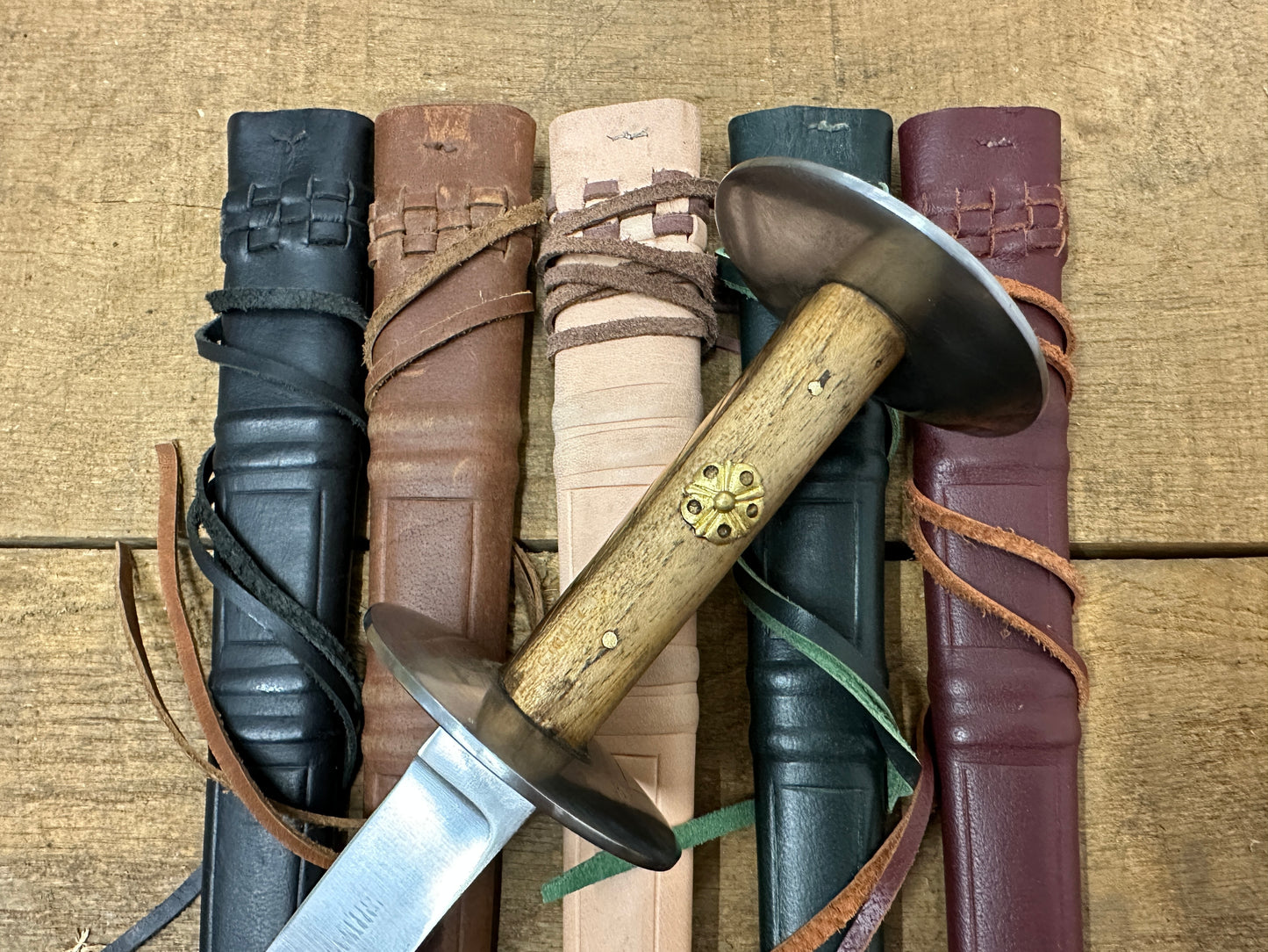Wallace Rondel close up on assorted scabbards. 