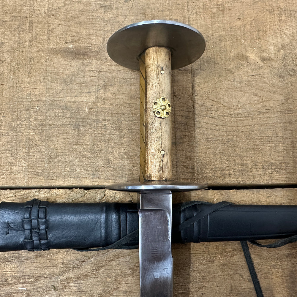 
                  
                    Wallace Rondel with a black scabbard
                  
                