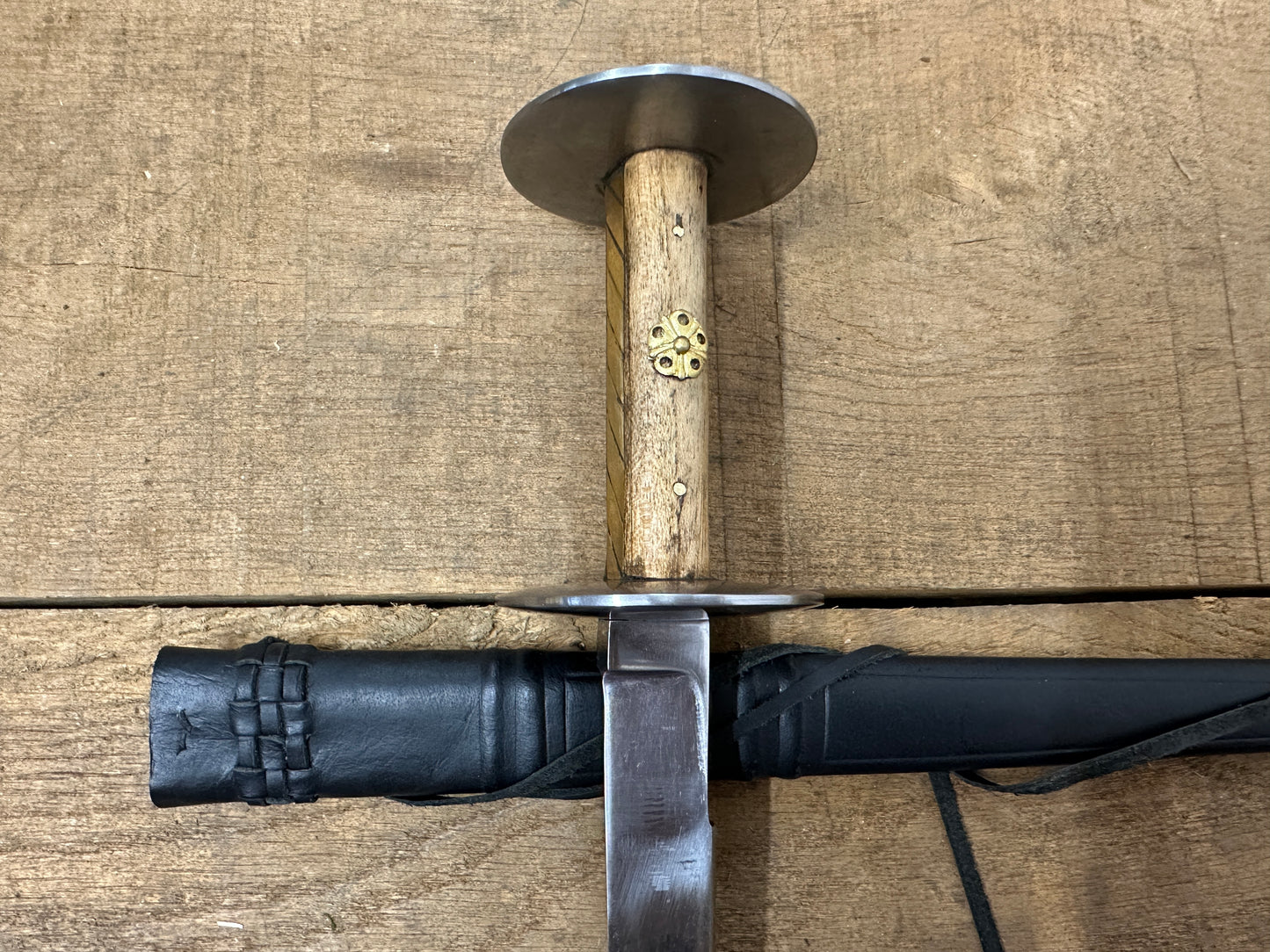 
                  
                    Wallace Rondel with a black scabbard
                  
                