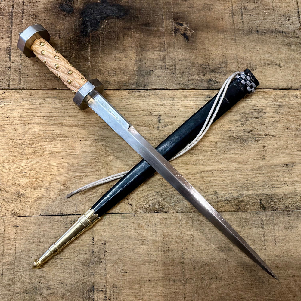 
                  
                    TC114 Armouries Rondel with a black scabbard
                  
                