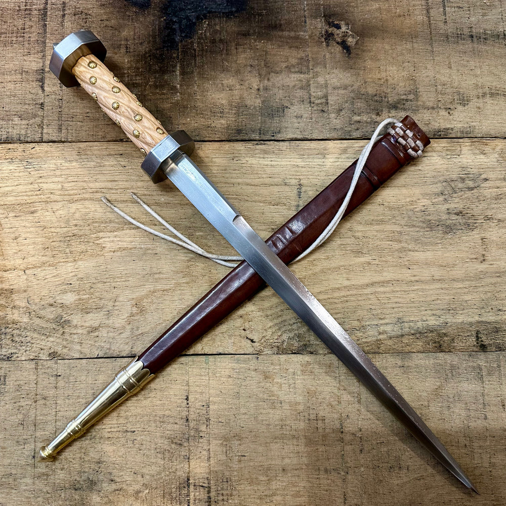 
                  
                    TC114 Armouries Rondel with a brown scabbard
                  
                