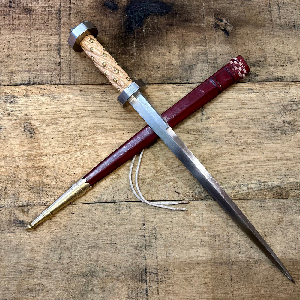 
                  
                    TC114 Armouries Rondel with a red scabbard
                  
                