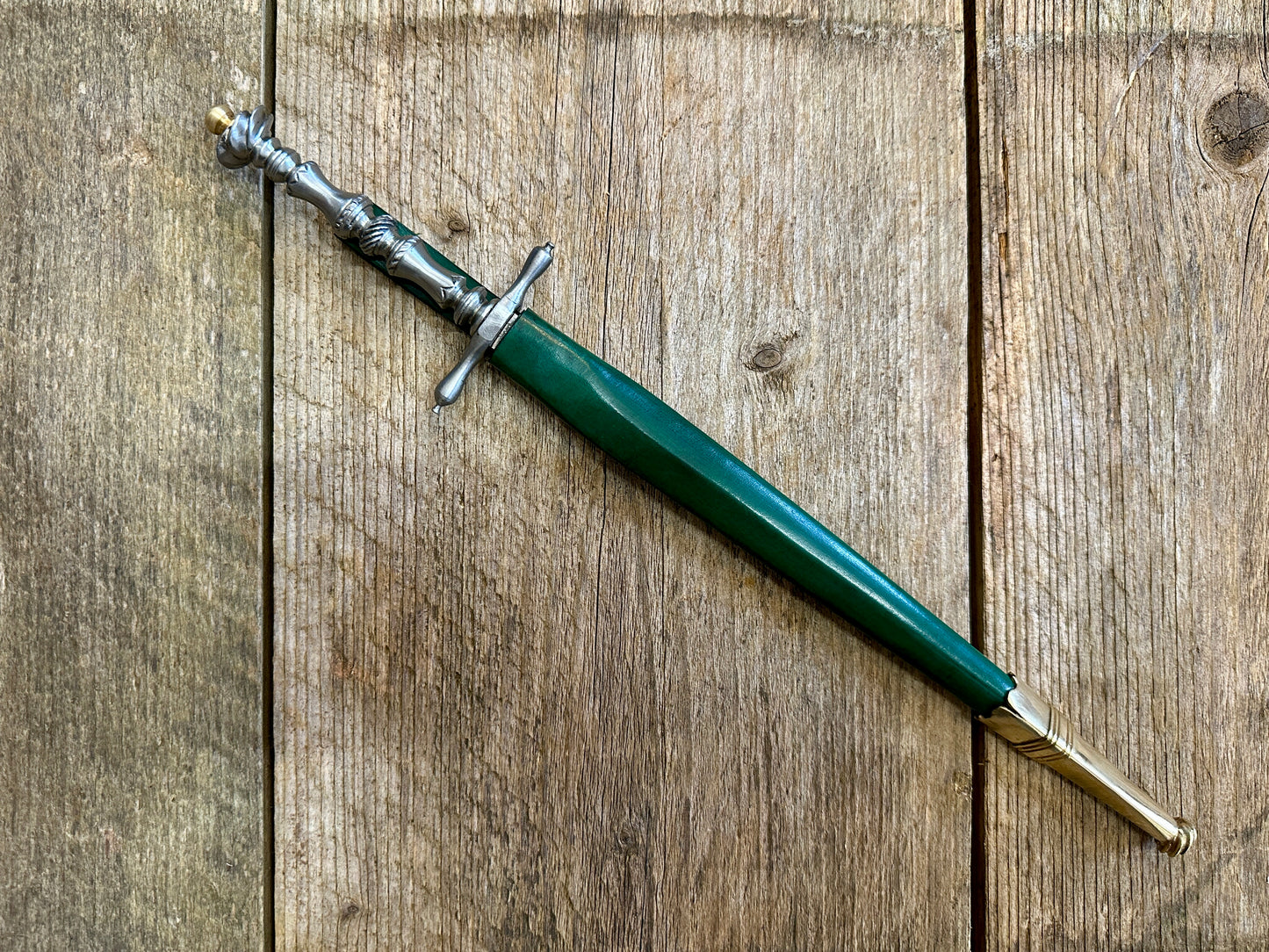 
                  
                    Pitt Rivers Stiletto in a green scabbard
                  
                