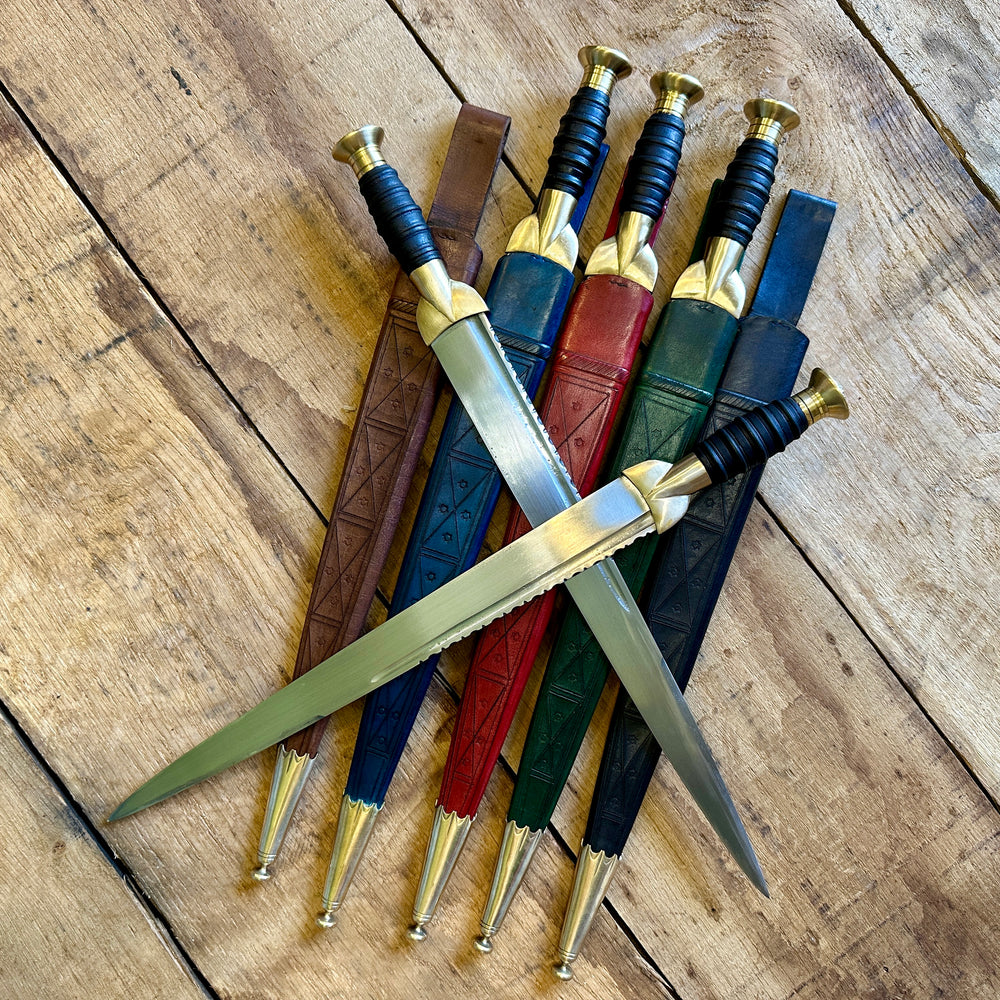 18thC long brass and wood dirk. Two knives in all scabbards.