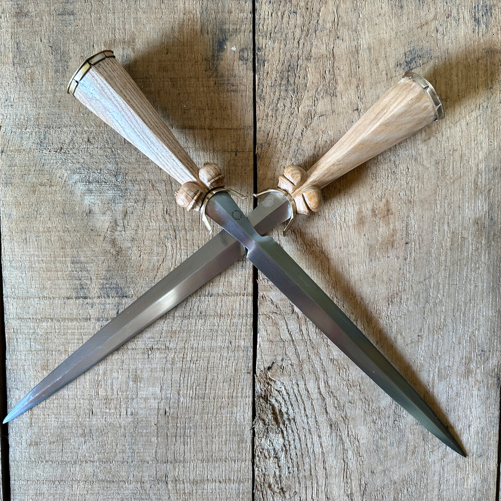 Simple Rothenburg Bollock Dagger in the form of two crossed knives.