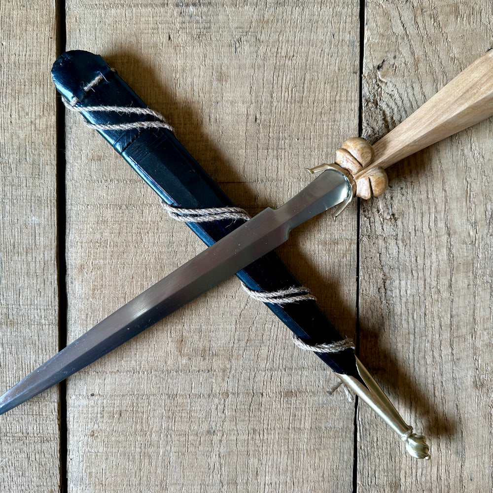 
                  
                    Simple Rothenburg Bollock Dagger with a black scabbard
                  
                