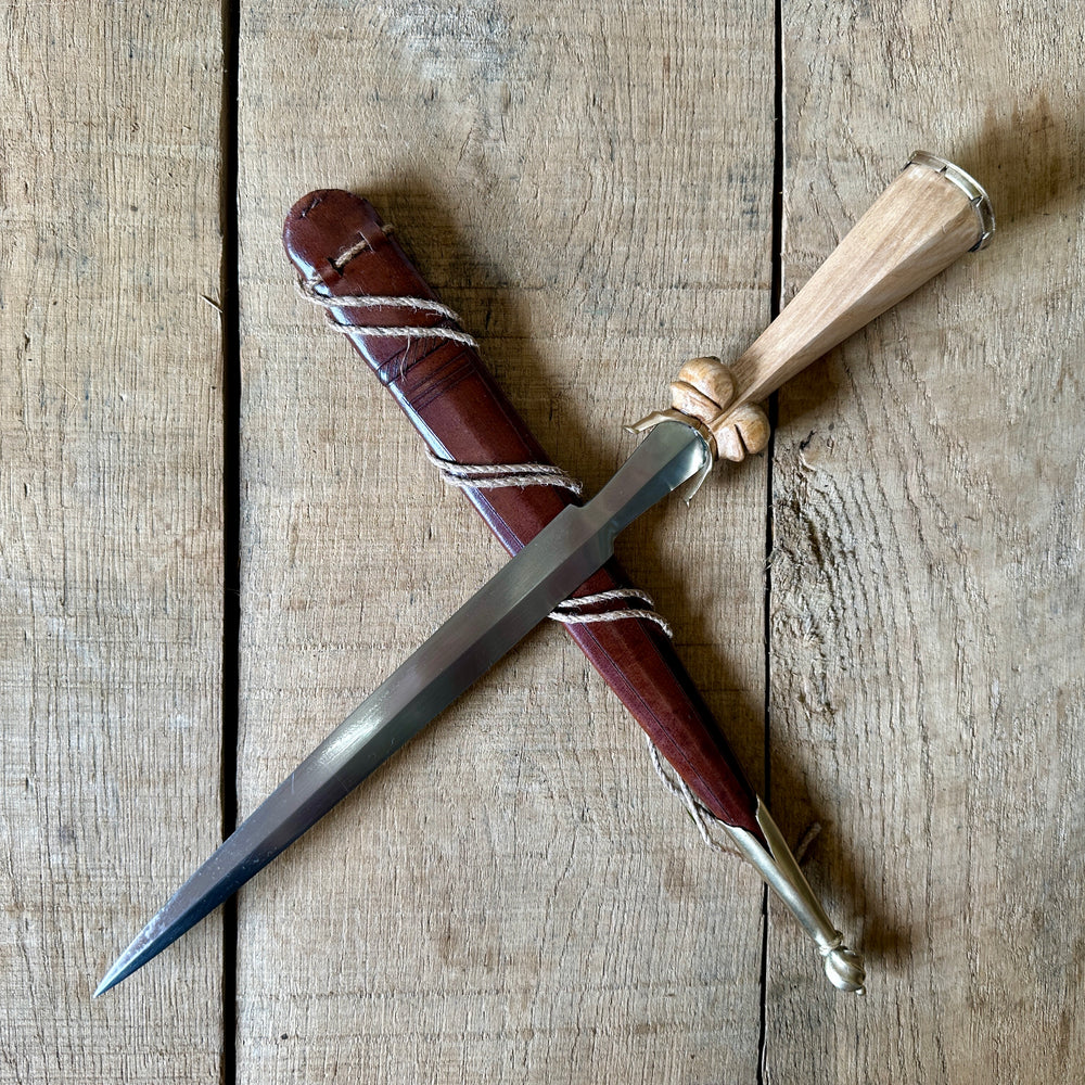 
                  
                    Simple Rothenburg Bollock Dagger with a brown scabbard
                  
                