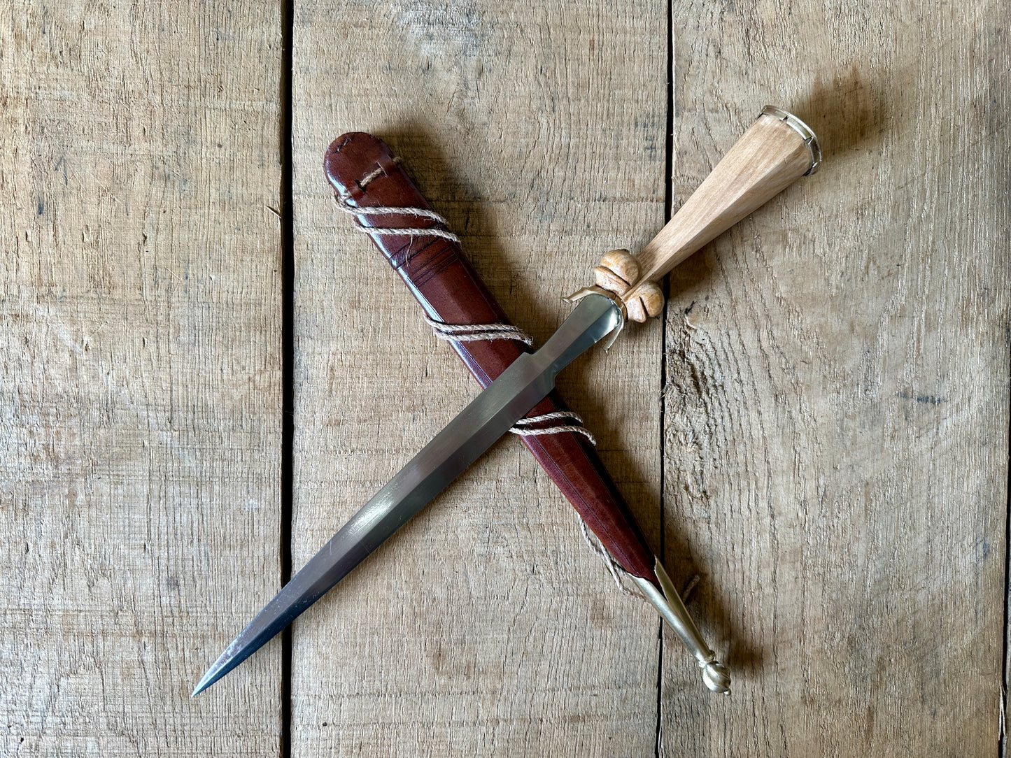 
                  
                    Simple Rothenburg Bollock Dagger with a brown scabbard
                  
                