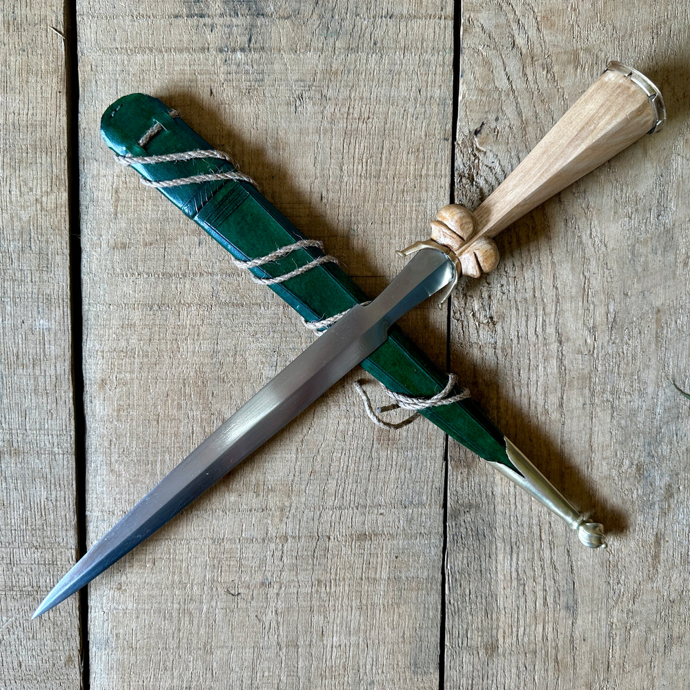 
                  
                    Simple Rothenburg Bollock Dagger with a green scabbard
                  
                