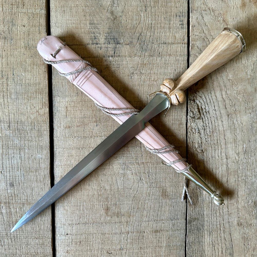 
                  
                    Simple Rothenburg Bollock Dagger with a natural scabbard.
                  
                