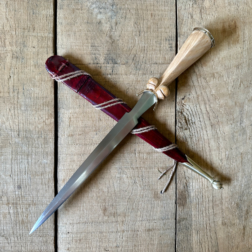 
                  
                    Simple Rothenburg Bollock Dagger with a red scabbard.
                  
                