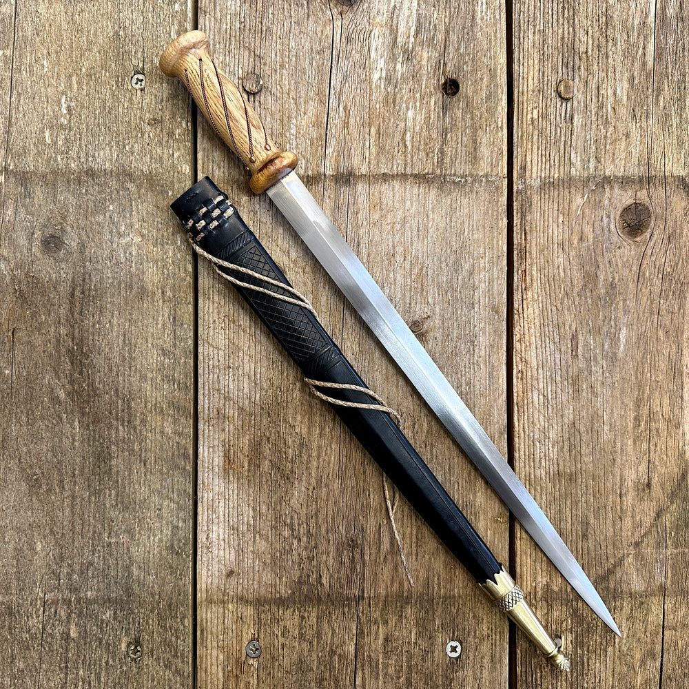 
                  
                    soldiers rondel with a black sheath
                  
                