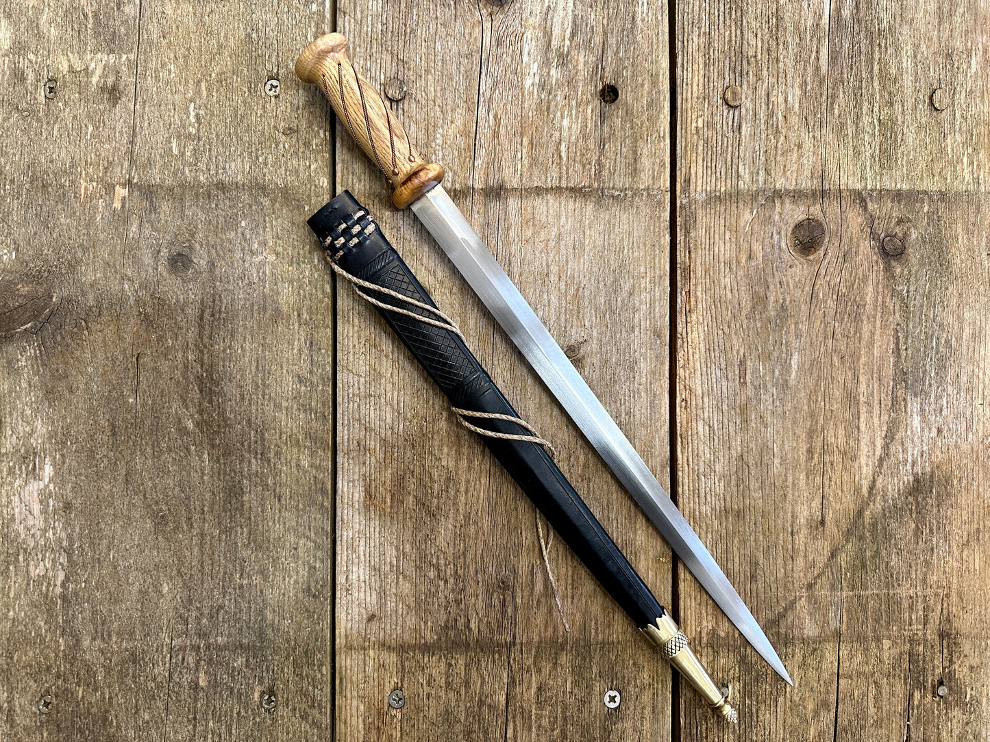 
                  
                    soldiers rondel with a black sheath
                  
                