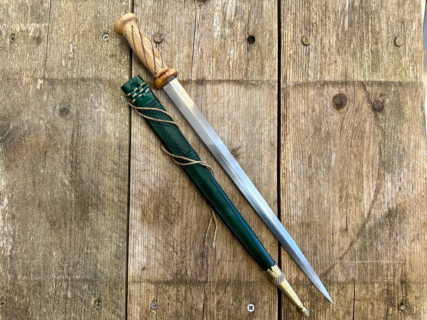 
                  
                    soldiers rondel with a green sheath
                  
                