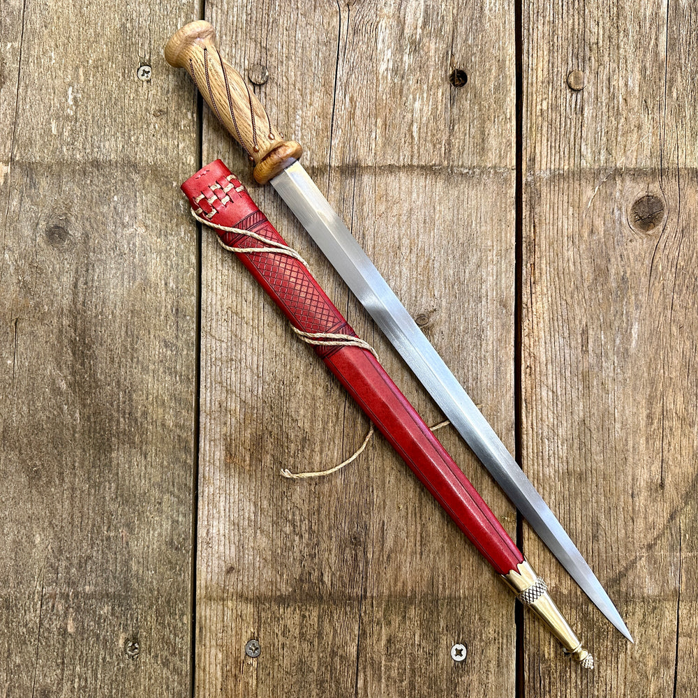 
                  
                    soldiers rondel with a red sheath
                  
                