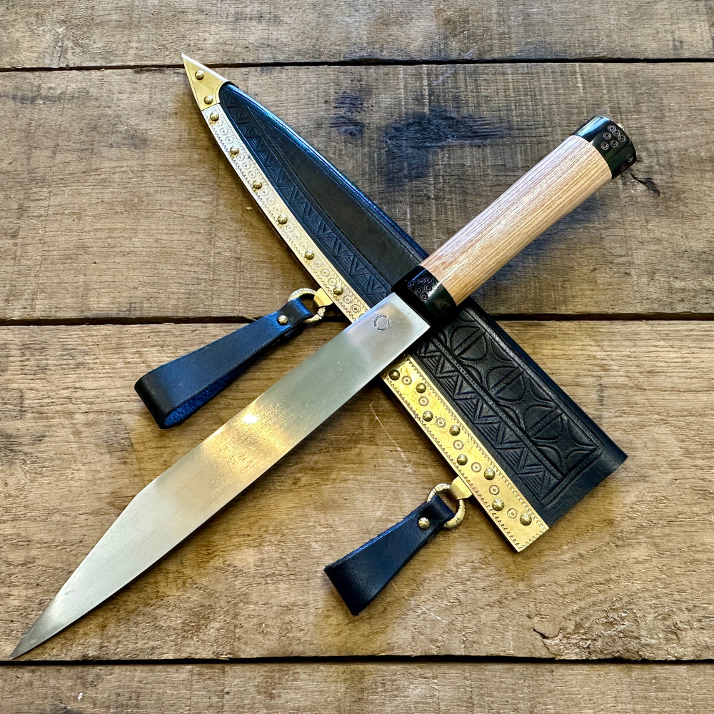 
                  
                    Decorated Anglo Saxon/Viking knife with a black scabbard
                  
                