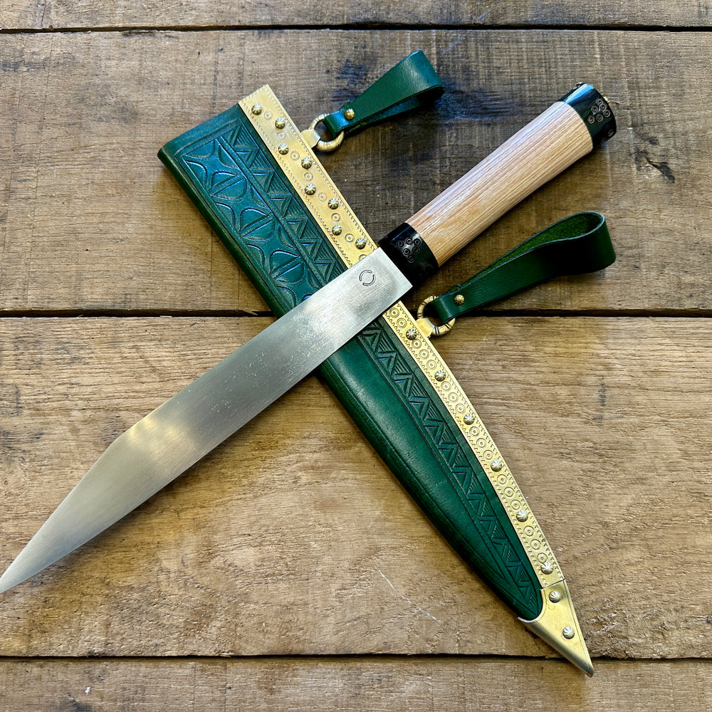 
                  
                    Decorated Anglo Saxon/Viking knife with a green scabbard
                  
                