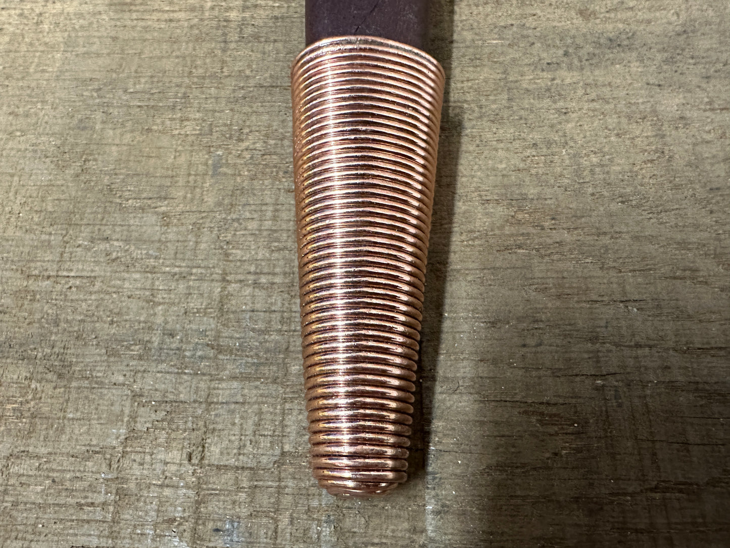 
                  
                    The copper wire chape of a long Irish Skean
                  
                