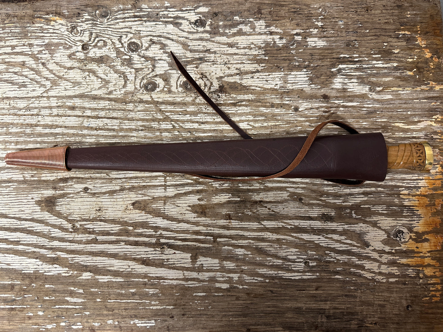 
                  
                    Long Irish Skean in a red scabbard
                  
                