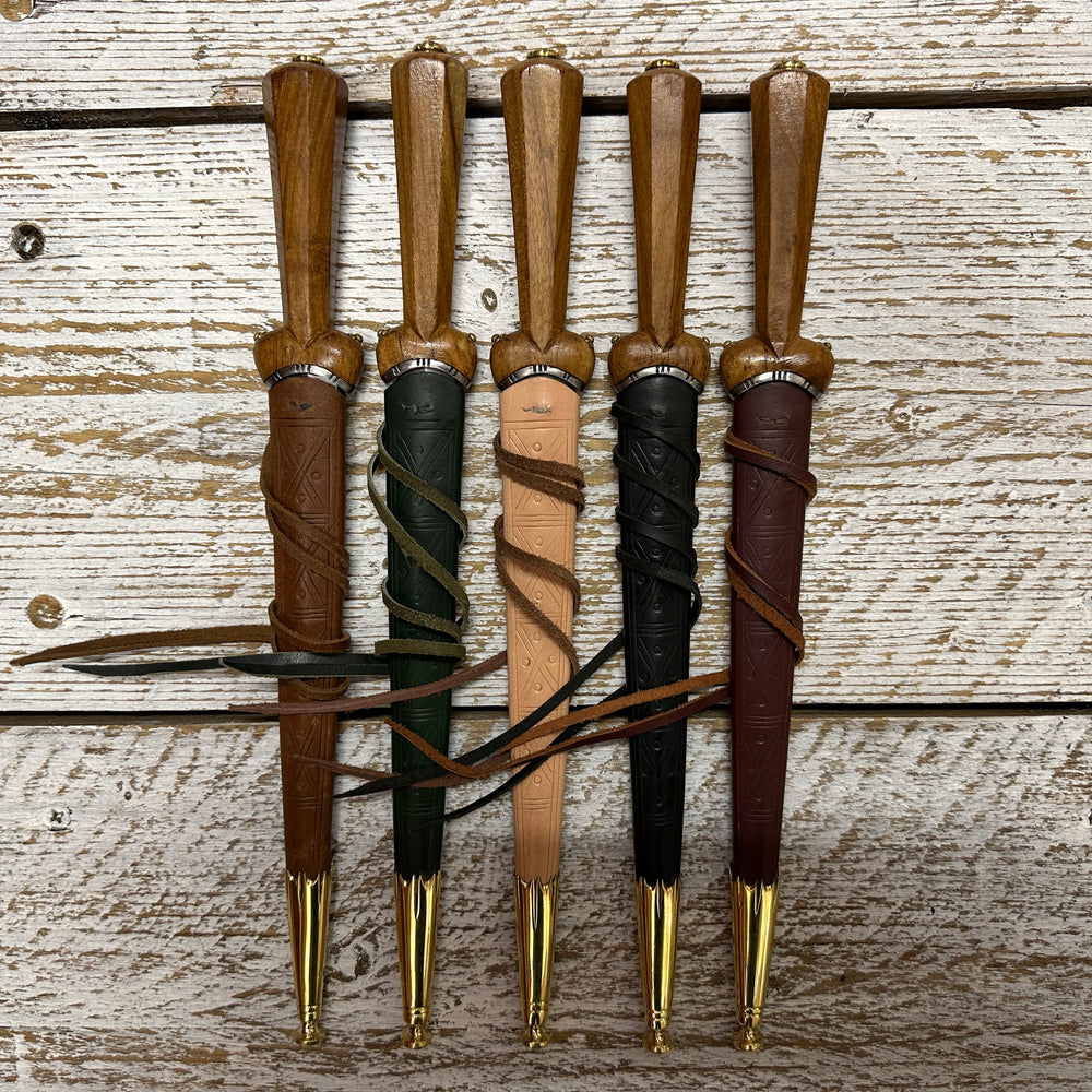 5 Dudgeon Daggers in brown, green, natural, black and red scabbards
