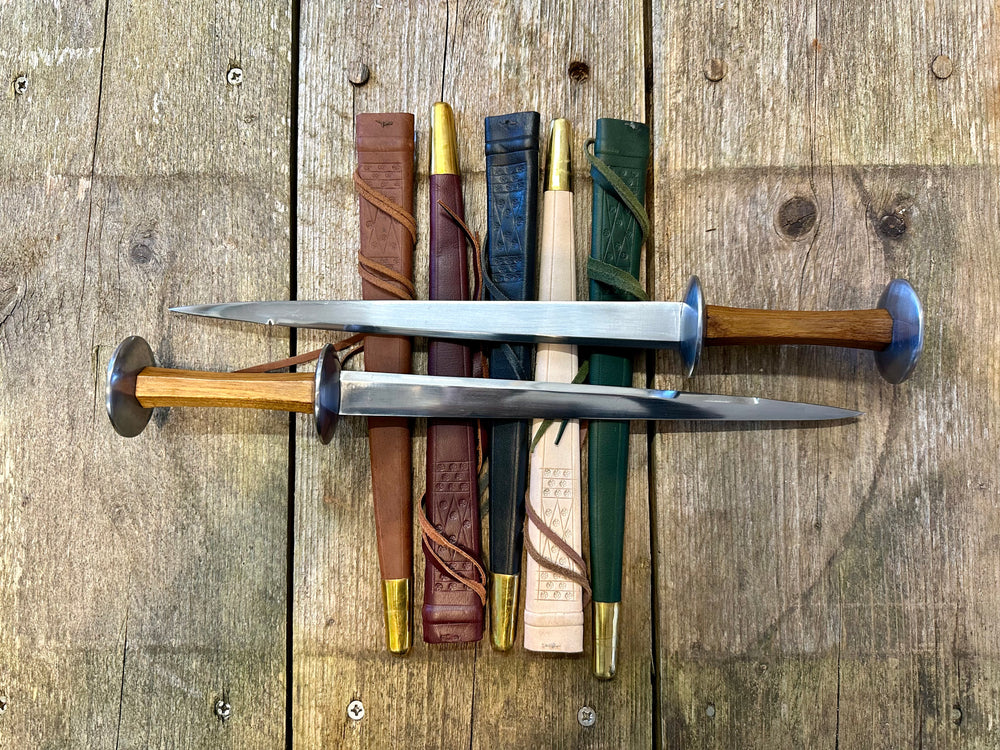 Tod Cutler Rondels on leather scabbards