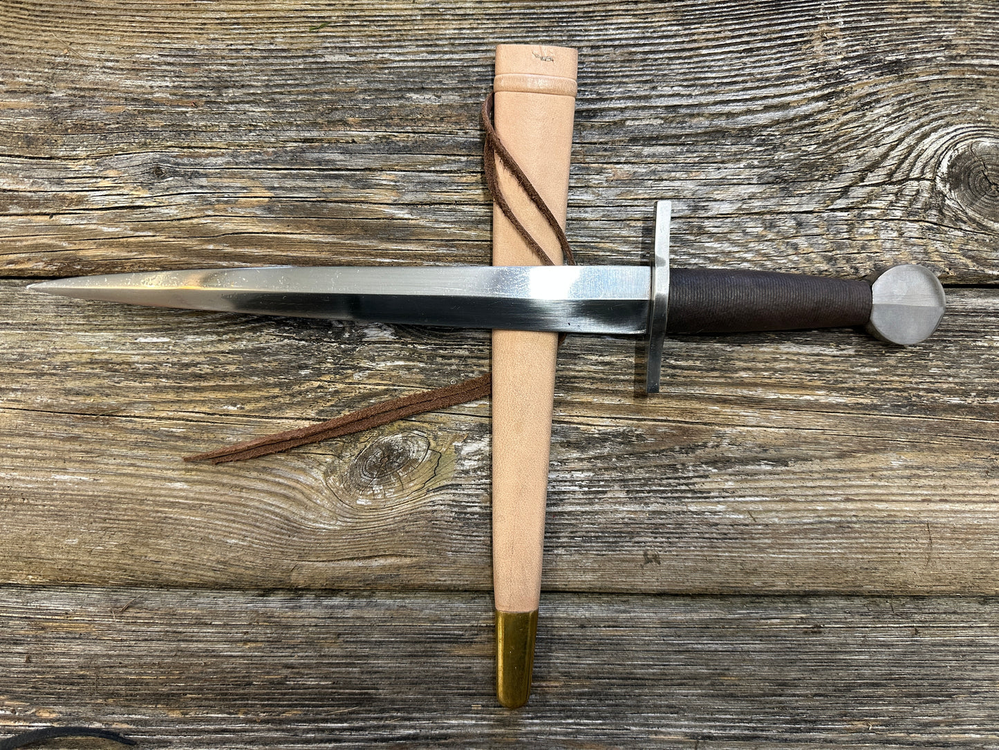 
                  
                    12-17thC Quillon Dagger with a natural scabbard

                  
                