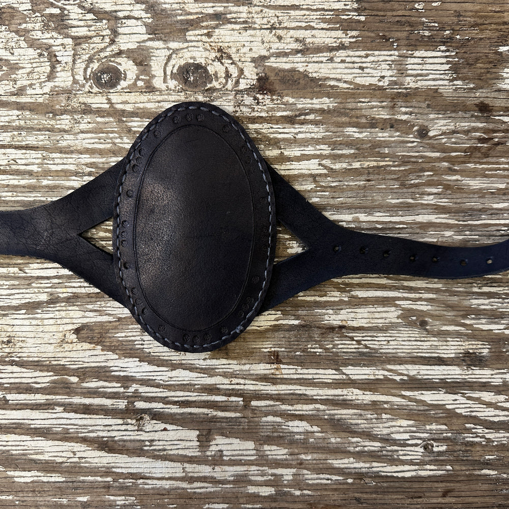 
                  
                    Oval archery bracer in black

                  
                