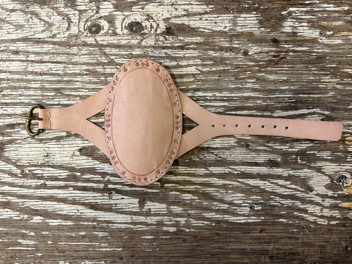 
                  
                    Oval archery bracer in natural
                  
                