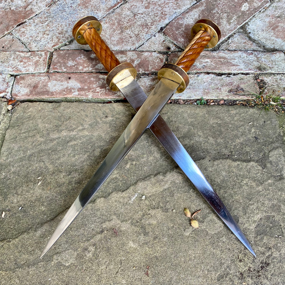 
                  
                    Pair of Tod Cutler Twisted Rondels 
                  
                