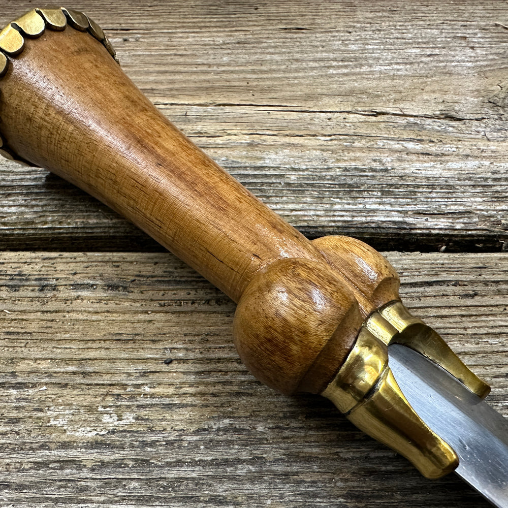 
                  
                    Mid status bollock dagger close. up of grip
                  
                