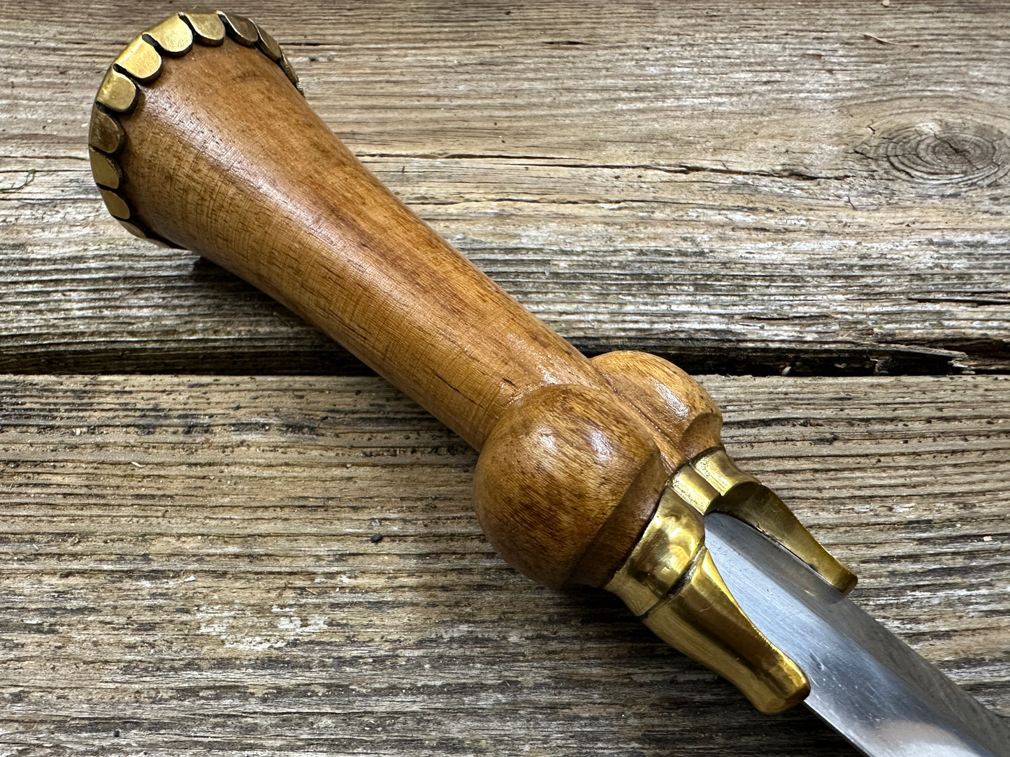 
                  
                    Mid status bollock dagger close. up of grip
                  
                