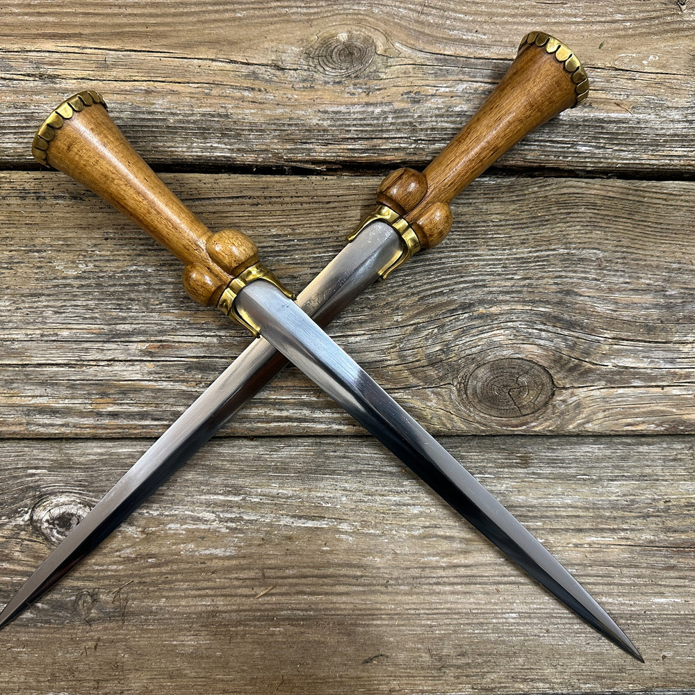 
                  
                    two Mid status bollock dagger with blades crossed.
                  
                