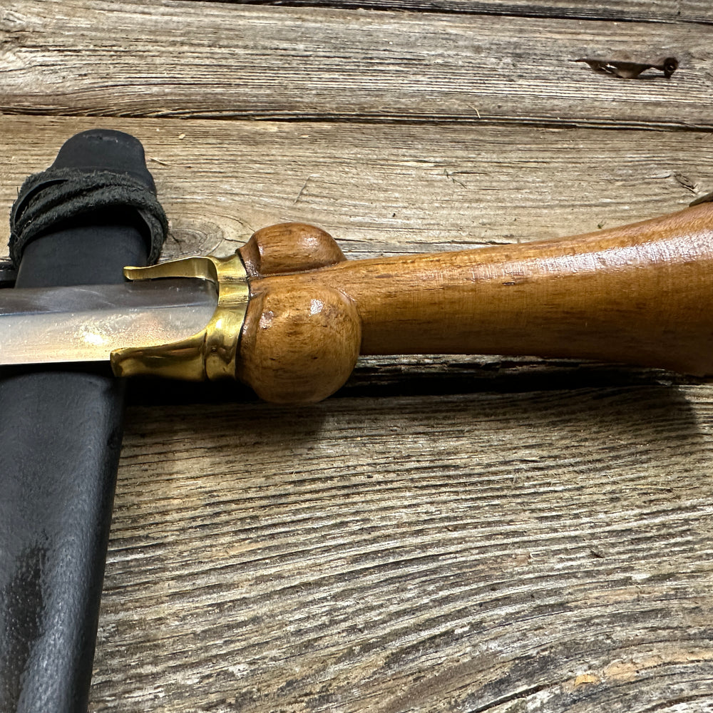 
                  
                    Mid status bollock dagger with a black scabbard
                  
                