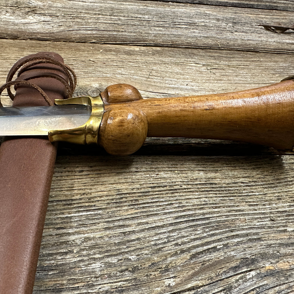 
                  
                    Mid status bollock dagger with a brown scabbard
                  
                