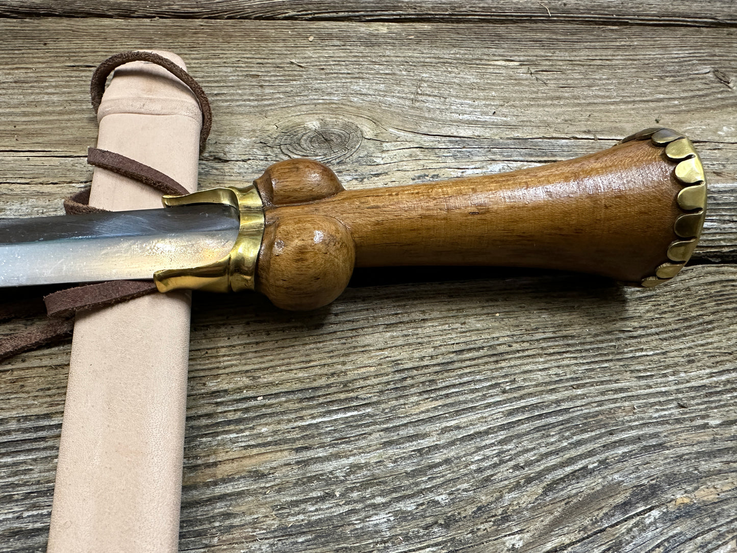 
                  
                    Mid status bollock dagger with a natural scabbard
                  
                