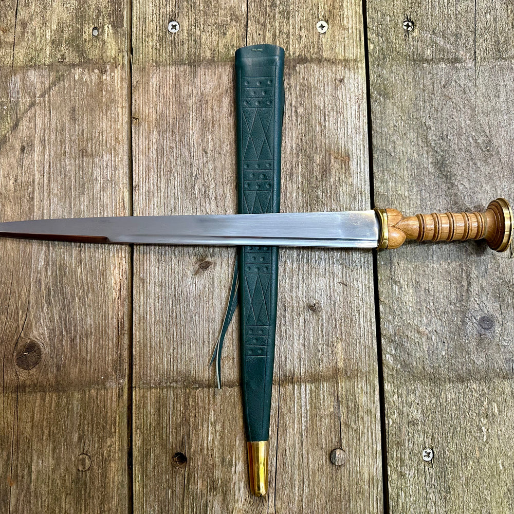 
                  
                    Tod Cutler Scottish Dirk with green scabbard
                  
                