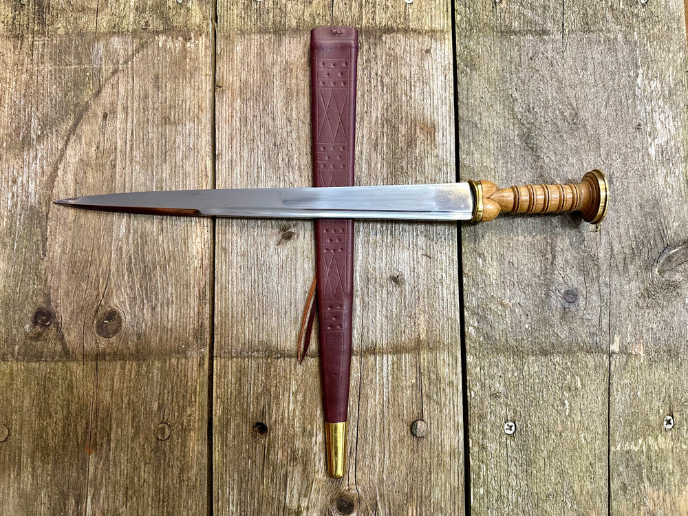 
                  
                    Tod Cutler Scottish Dirk with red scabbard
                  
                