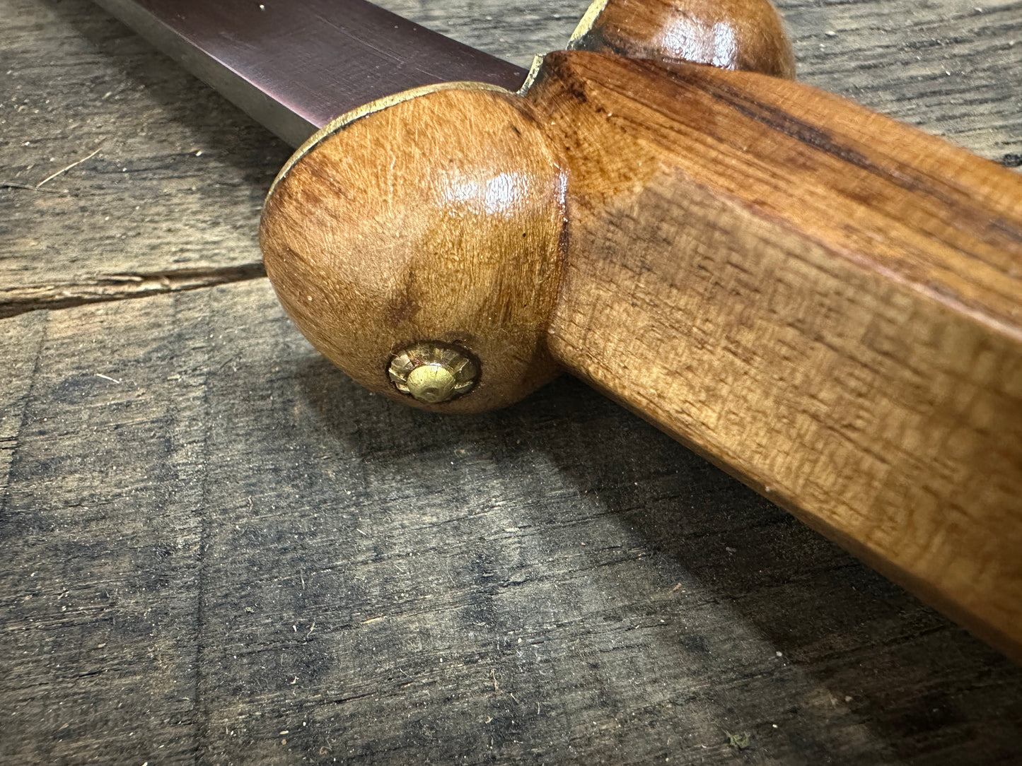 
                  
                    A close up of the stud on one of the balls of a Mary Rose Bollock Dagger
                  
                