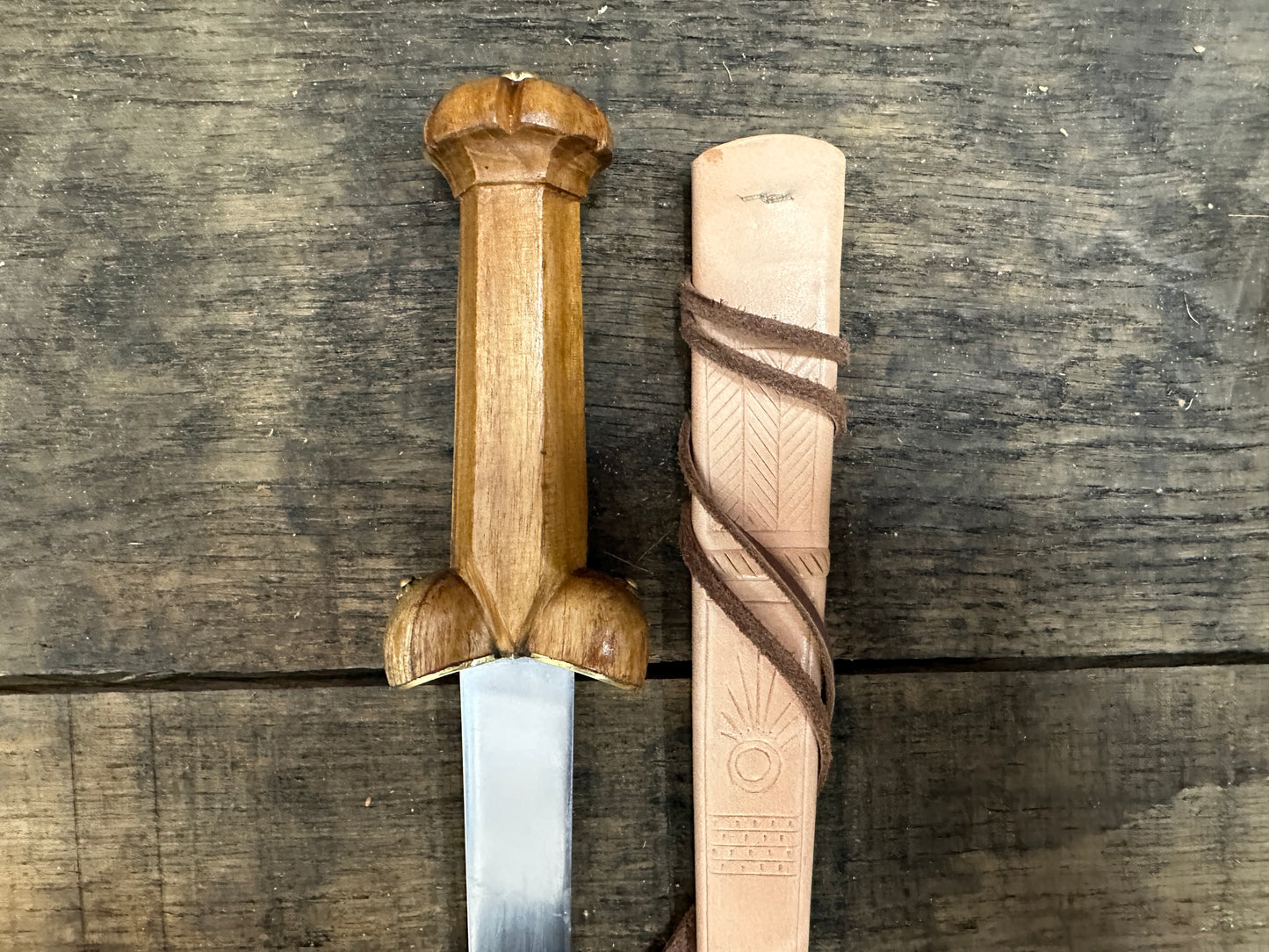 
                  
                    A Mary Rose Bollock Dagger with a natural scabbard. 
                  
                