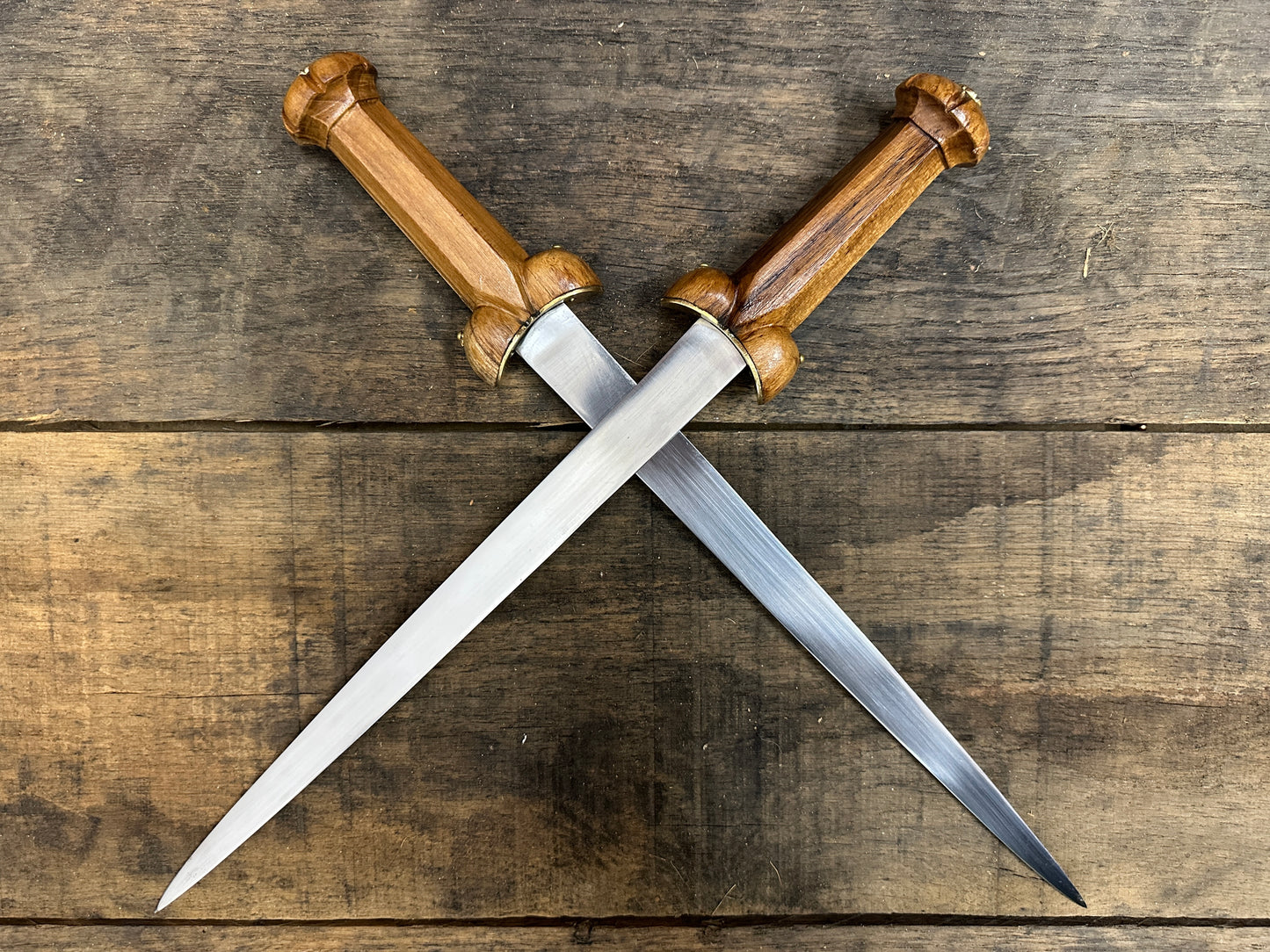 
                  
                    Two Mary Rose Bollock Daggers crossing each other. 
                  
                