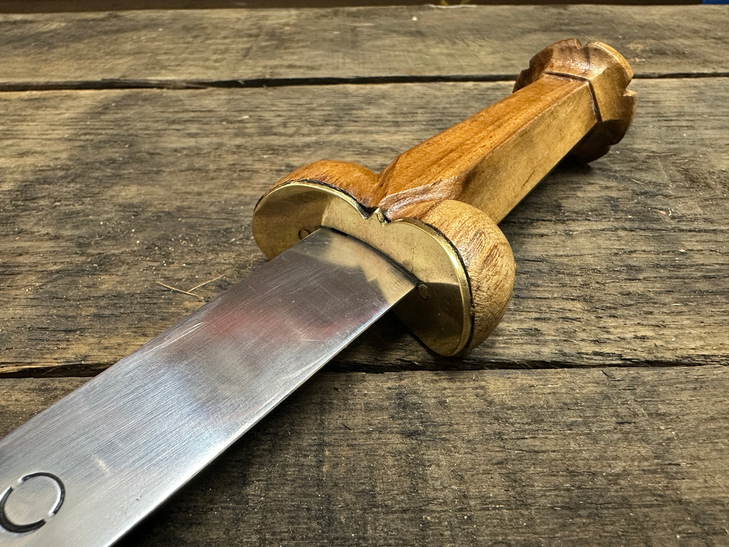 
                  
                    Viewing a Mary Rose Bollock Dagger from the blade upwards. 
                  
                