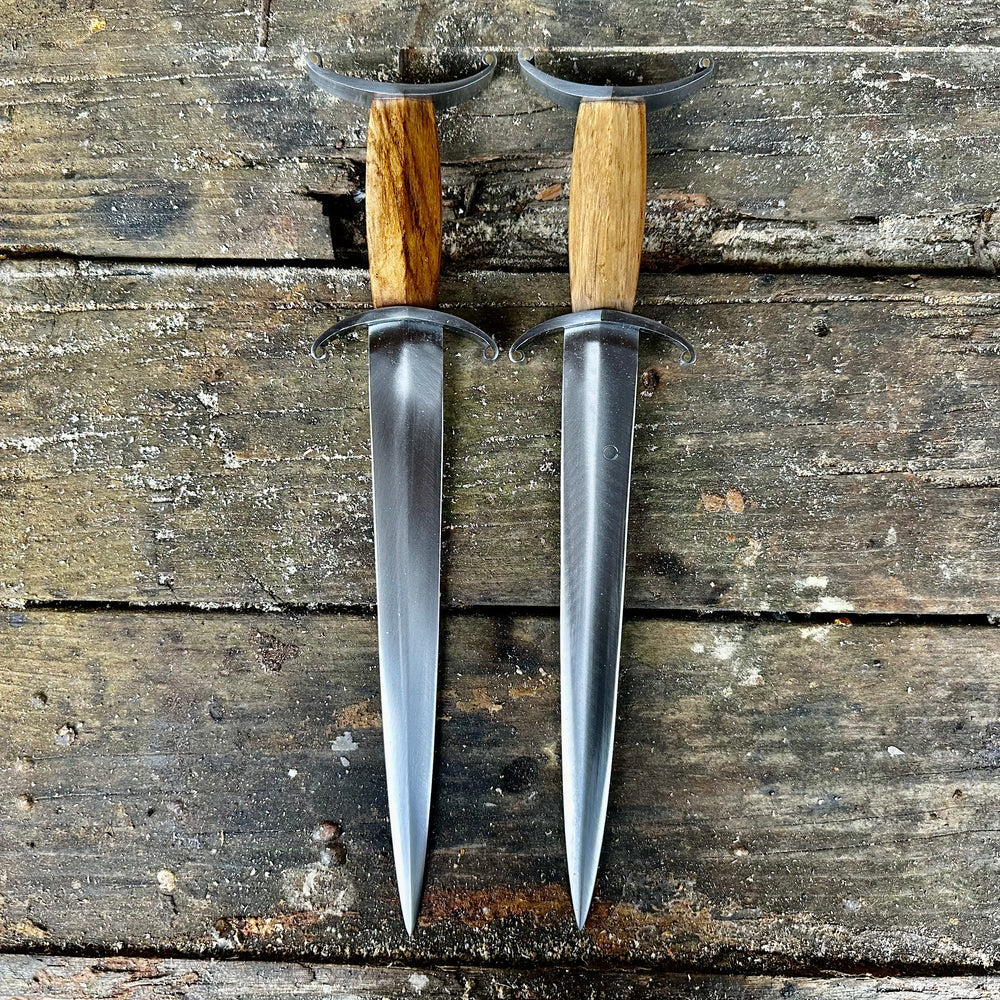 
                  
                    Tod Cutler Antenna Dagger 11-14thC. Two pictured next to each other 
                  
                